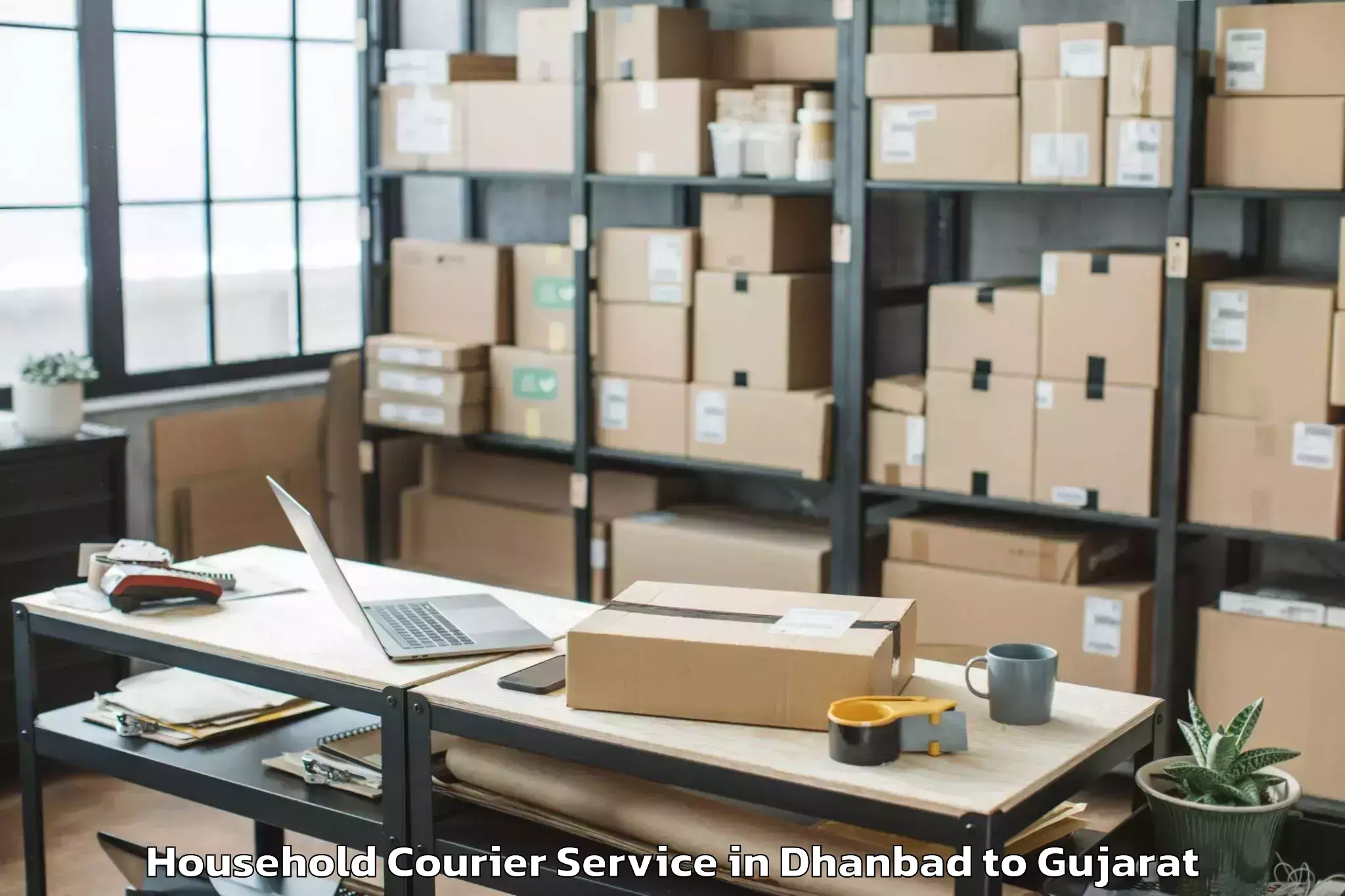 Hassle-Free Dhanbad to Adalaj Household Courier